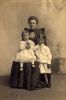 Dorothy Frances Lackey, sitting on the lap of Laura Emma (Sellers) Lackey and Amos Clark Lackey